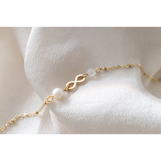 Infinity & Parel Armband - Goud