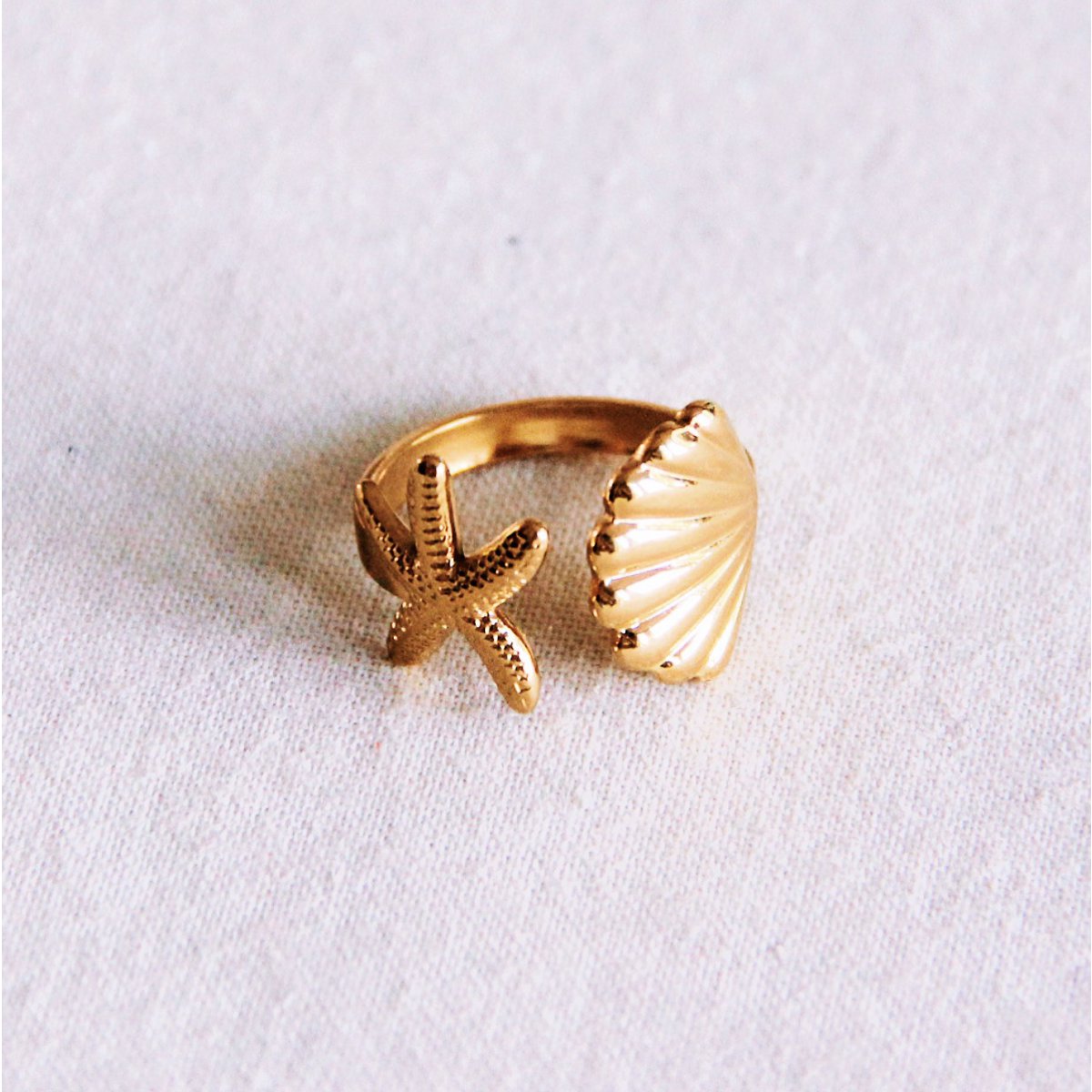 Open ring met zeester en shell